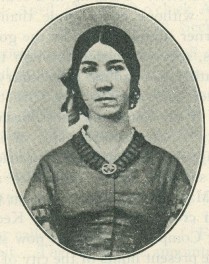 A photograph of Julia Beatrice Kinney seated, c. 1860.  DOI: 4