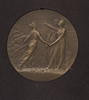 Back of Wilson medal with three female figures.
