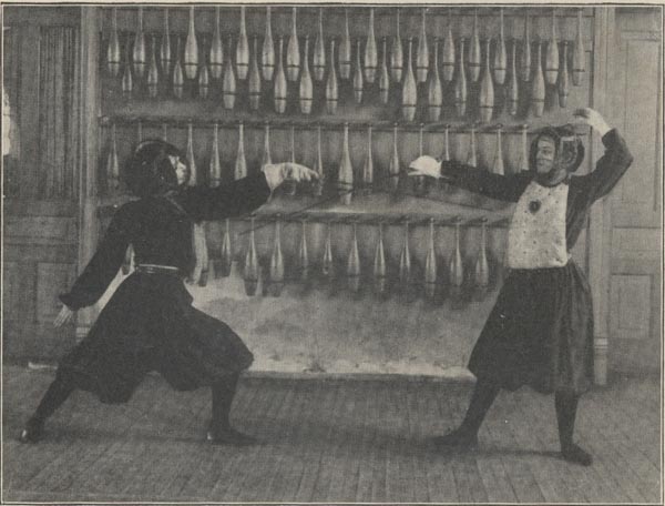 A photograph of Adelloyd Whiting and Edith Schwartz fencing, 1899.