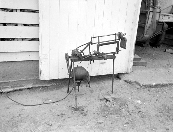 A photograph of a homemade electric power hacksaw.