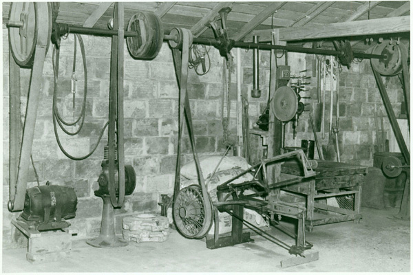 An early photograph of an unknown wood shop.