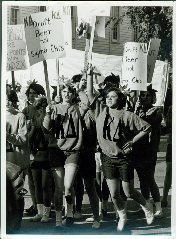 A photograph of sorority women protesting the draft during Sigma Chi derby days ca. 1960.